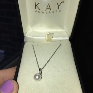 Genuine pearl and diamond necklace